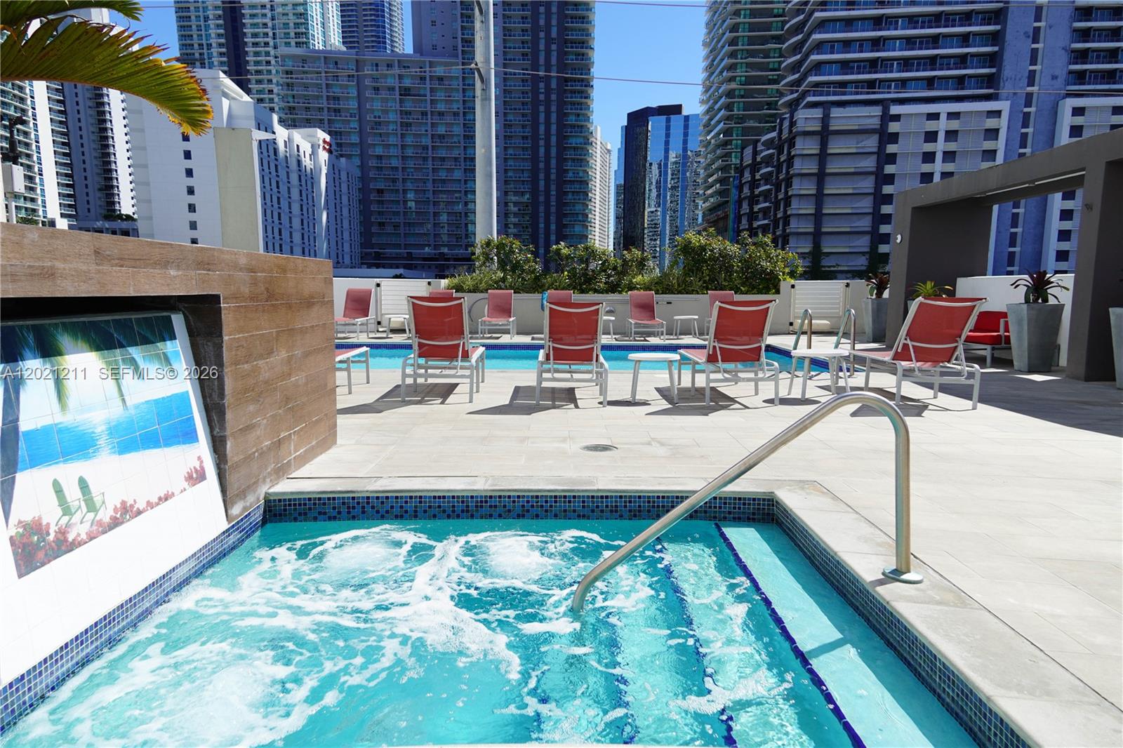 110 Southwest 12th Street, Unit 708 Miami, FL 33130 - Photo 8 of 10 a view of backyard with swimming pool and patio