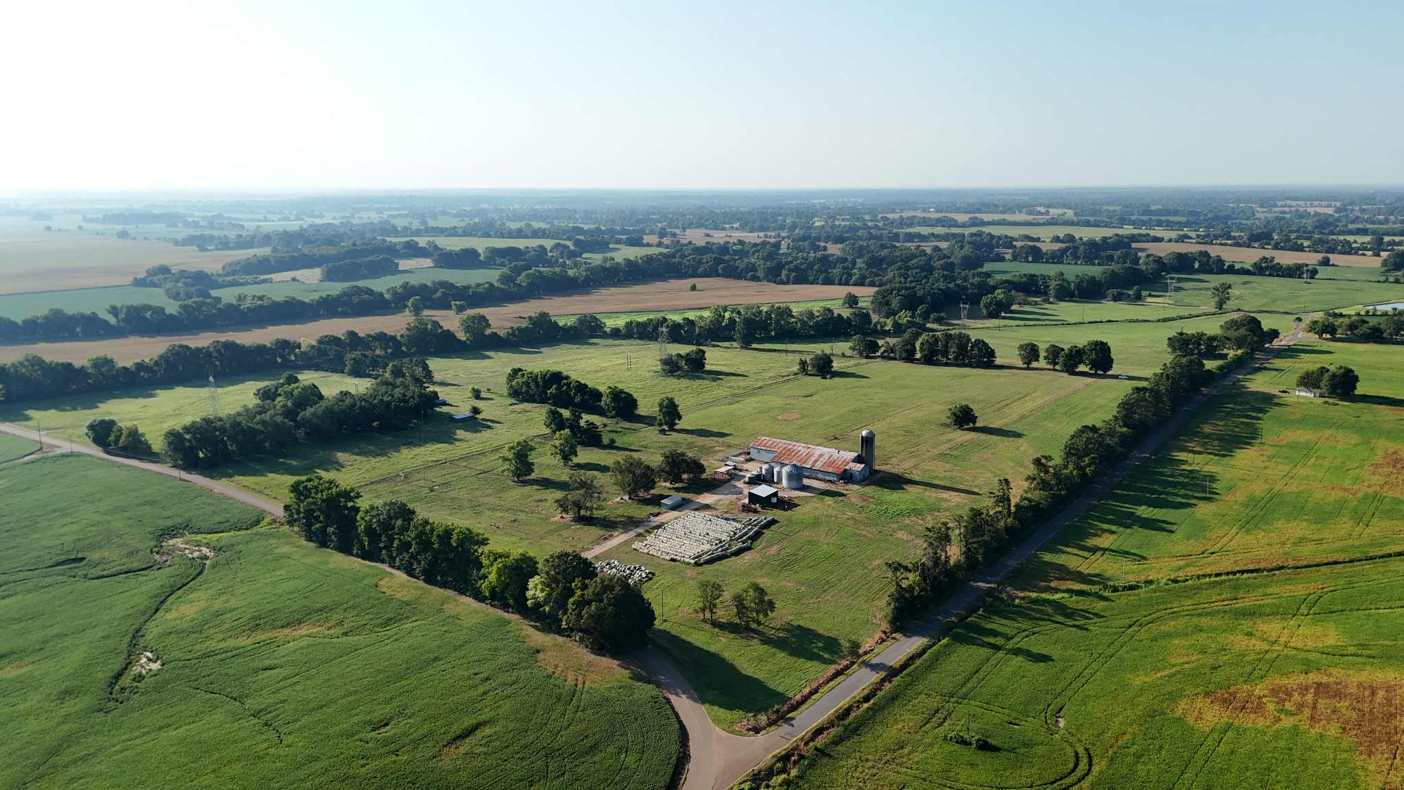 an aerial view of a golf course with outdoor space