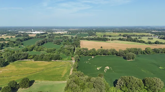 a view of a lake with a city