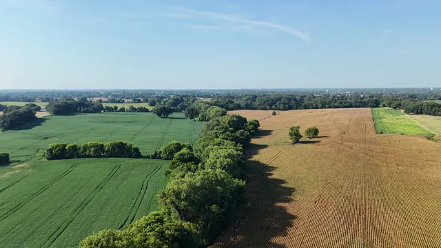 a view of a lake with a big yard