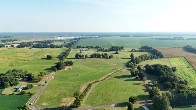 an aerial view of a golf course with outdoor space
