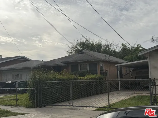 a front view of a house with garage
