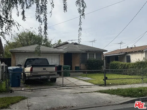 a car parked in front of a house