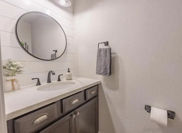 a view of swimming pool with a table and chairs