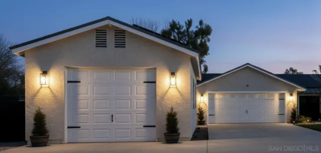 a view of a house with a small yard