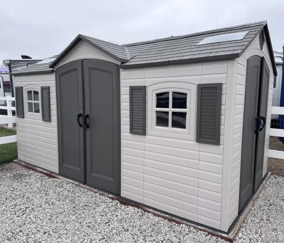 view of living room with furniture and floor to ceiling window