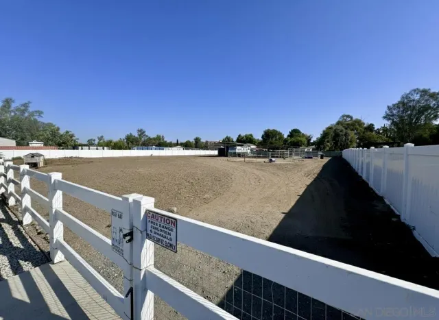 an aerial view of a house with pool