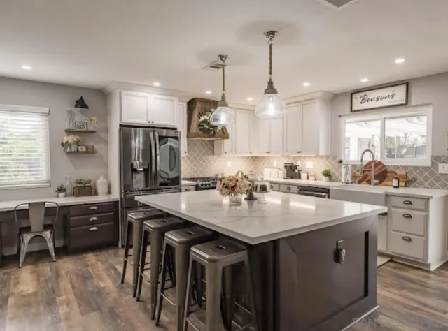 a kitchen with a sink and a window