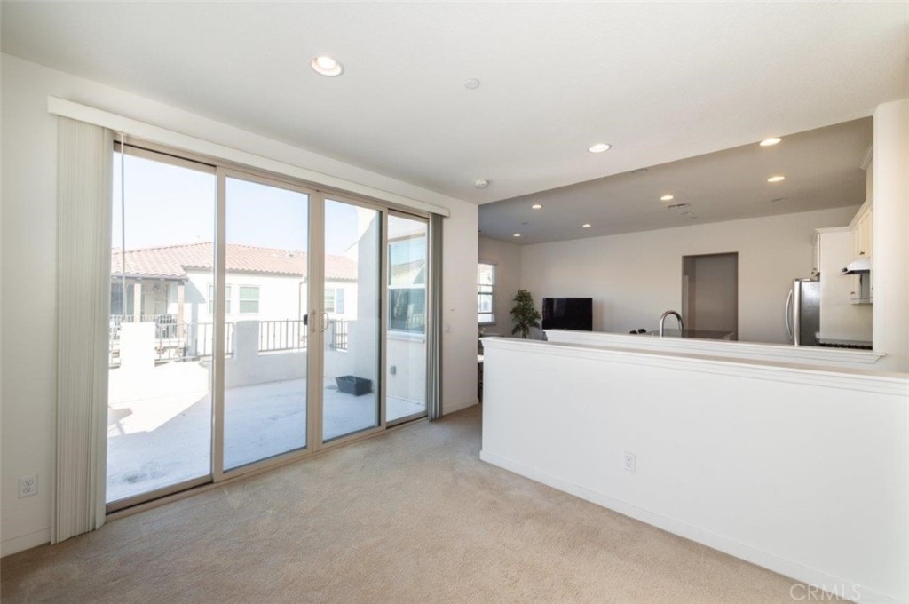 180 Borrego Irvine, CA 92618 - Photo 16 of 23 a living room with furniture and a large window