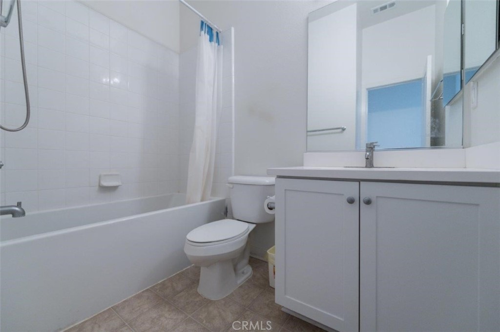 180 Borrego Irvine, CA 92618 - Photo 21 of 23 a bathroom with a sink toilet and shower