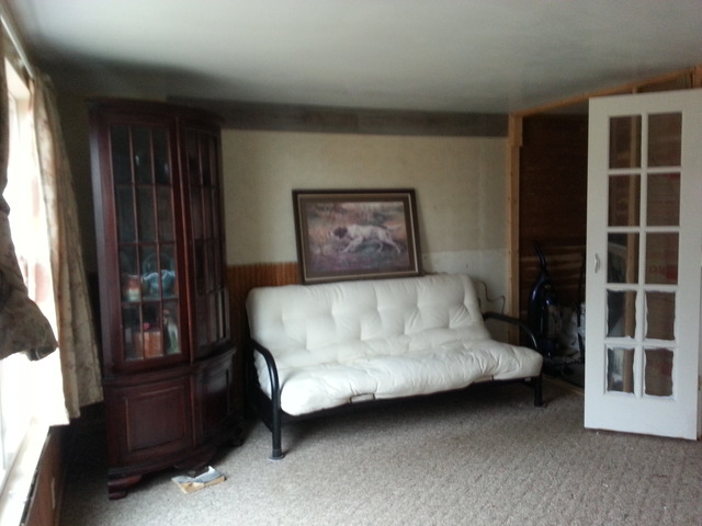 1453 Houghtby Road Shabbona, IL 60550 - Photo 13 of 22 a bedroom with a bed painting and a large window