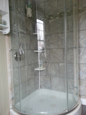 1453 Houghtby Road Shabbona, IL 60550 - Photo 15 of 22 a bathroom with a shower
