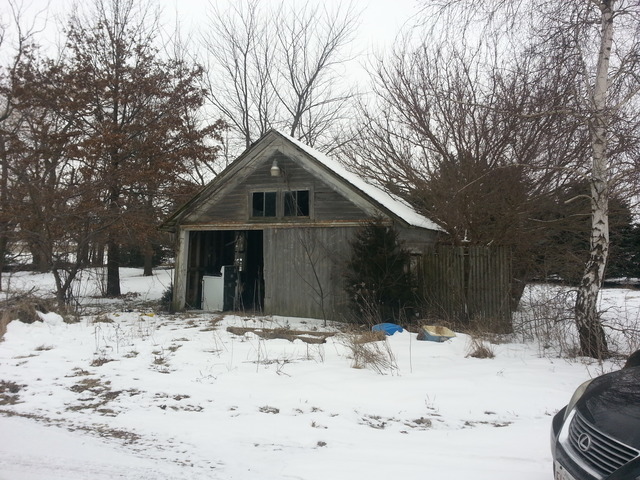 1453 Houghtby Road Shabbona, IL 60550 - Photo 22 of 22 a view of a house covered in snow