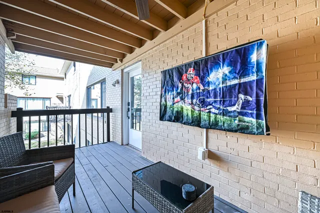 a living room with a wooden floor