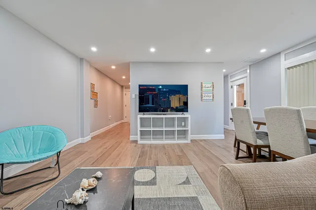 a living room with a couch and a flat screen tv