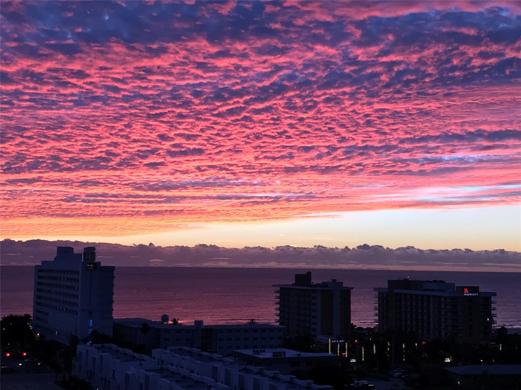 1401 North Riverside Drive, Unit PH1502 Pompano Beach, FL 33062 - Photo 7 of 32 front view of a house with a yard