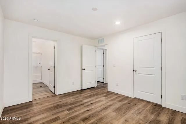 a view of a livingroom with wooden floor