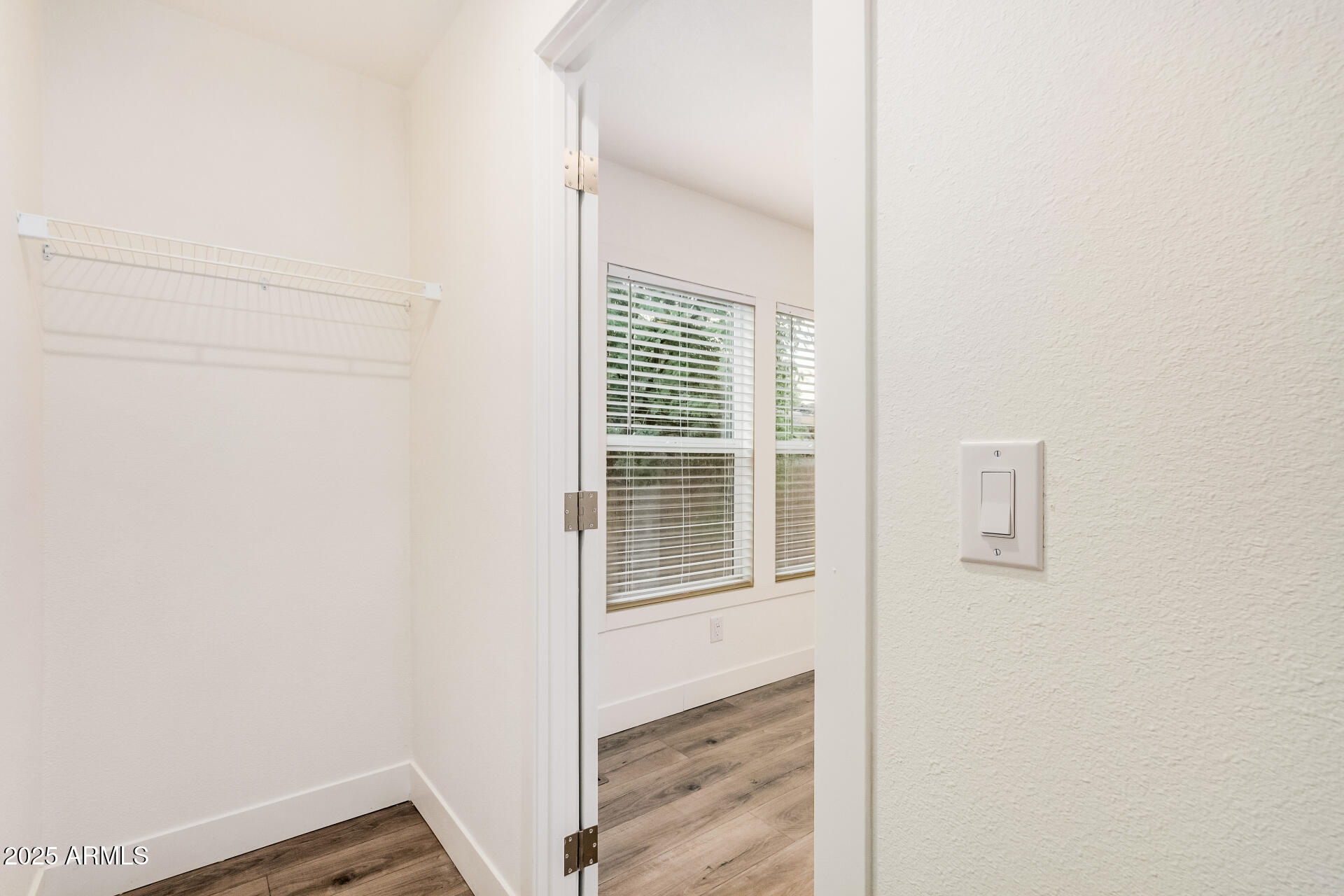 11441 East 4th Avenue Apache Junction, AZ 85120 - Photo 19 of 30 a view of an empty room with a window