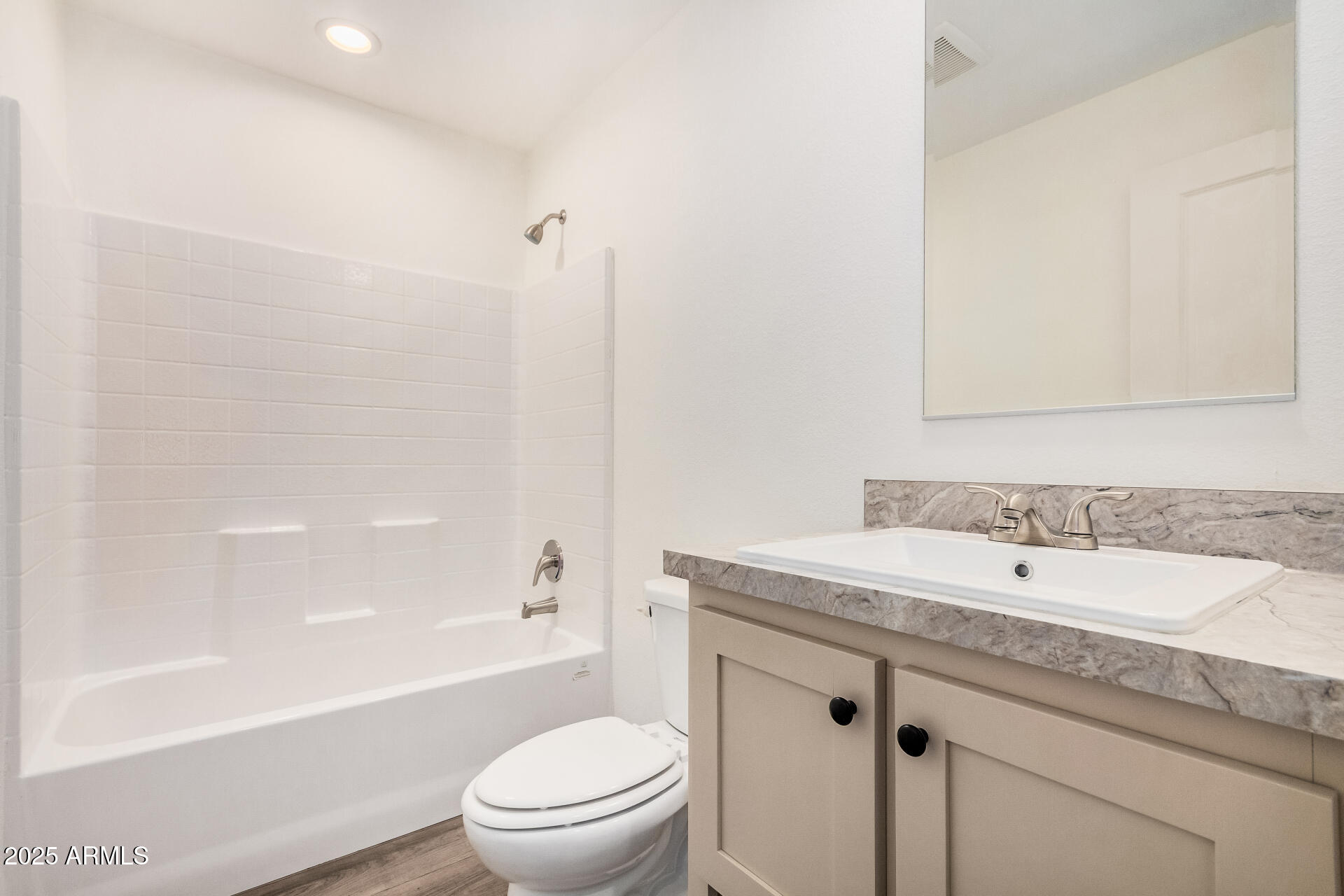 11441 East 4th Avenue Apache Junction, AZ 85120 - Photo 24 of 30 a bathroom with a sink a toilet and shower
