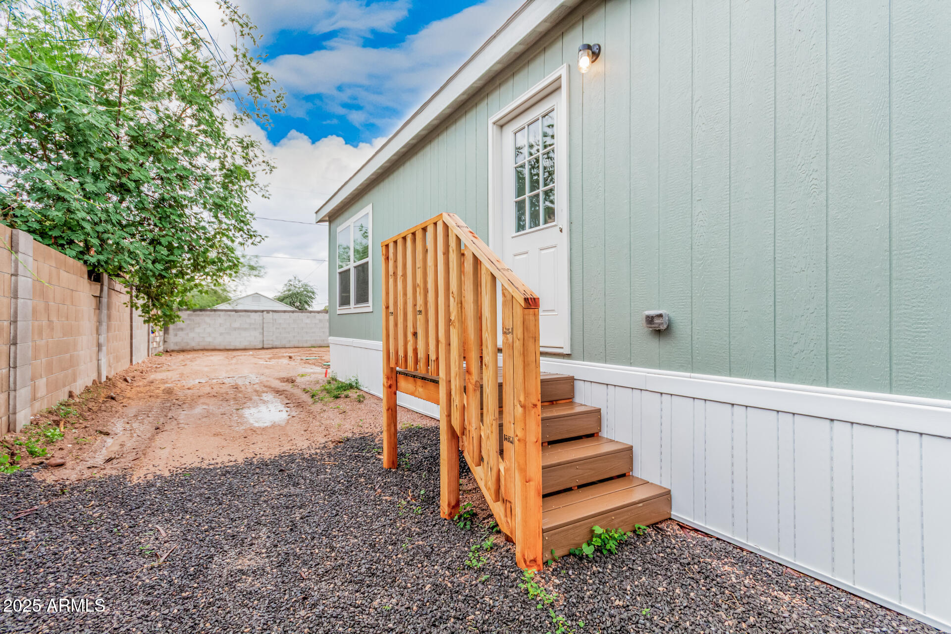 11441 East 4th Avenue Apache Junction, AZ 85120 - Photo 30 of 30 a view of a house with a yard