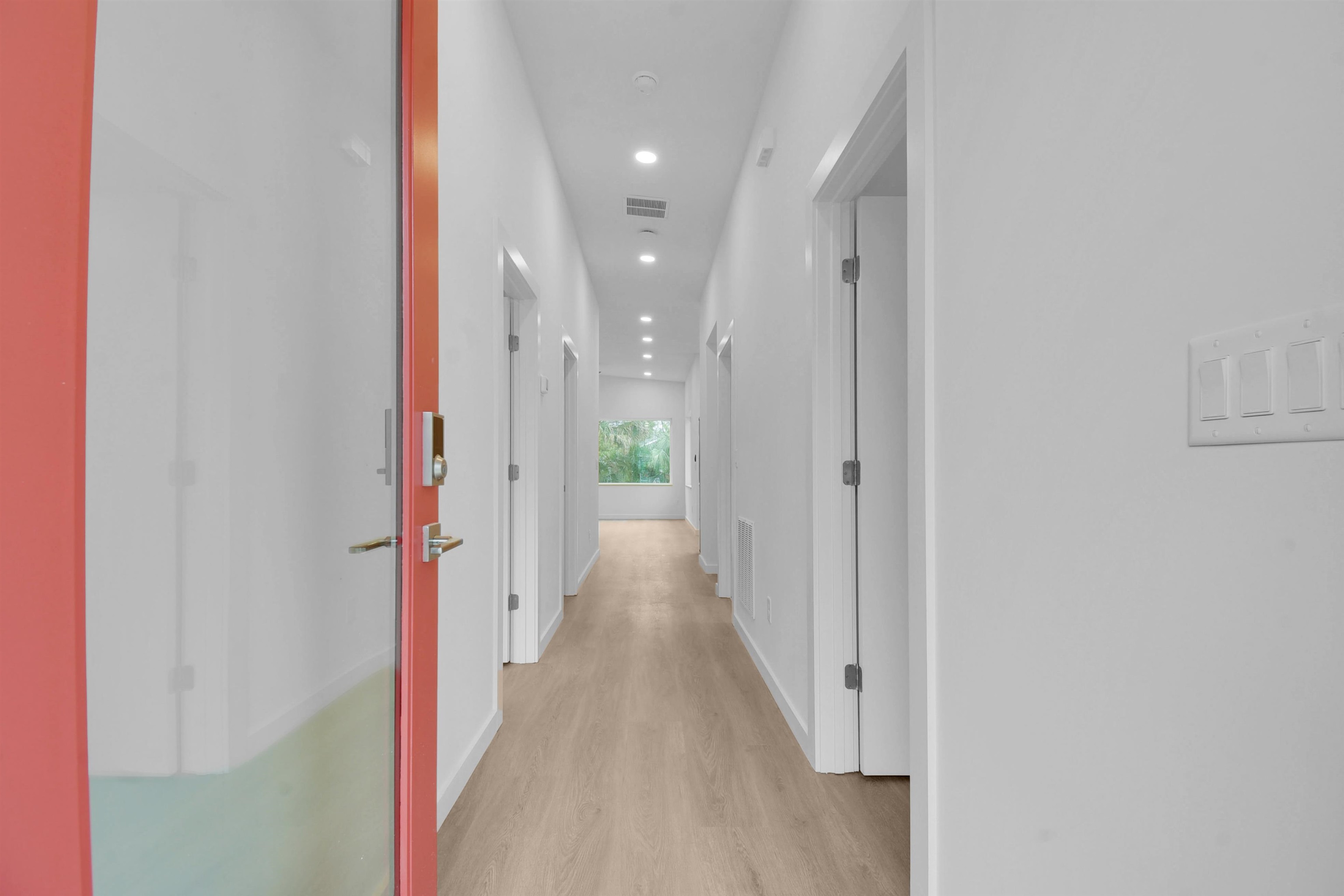 541 Columbus Street St. Augustine, FL 32084 - Photo 4 of 26 a view of a hallway with wooden floor