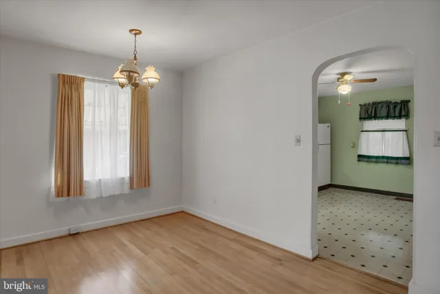 a view of an empty room and window