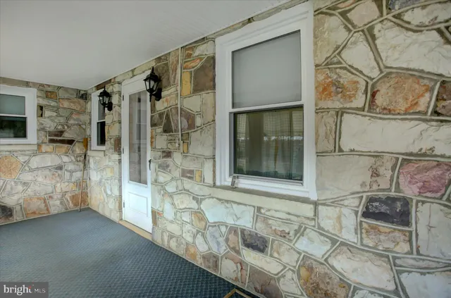 a view of a hallway with entryway