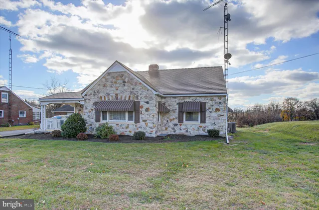 a big house with a big yard and more windows