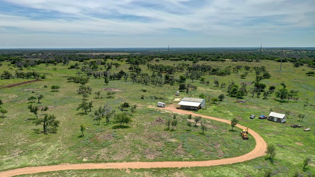 1443 Gina Road Harper, TX 78631 - Photo 13 of 49 a view of a lake with a yard