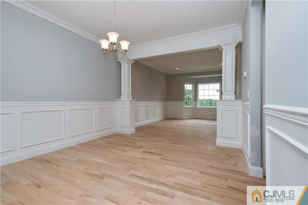 80 Ethel Road Edison, NJ 08817 - Photo 6 of 18 a view of a chandelier in big room and chandelier