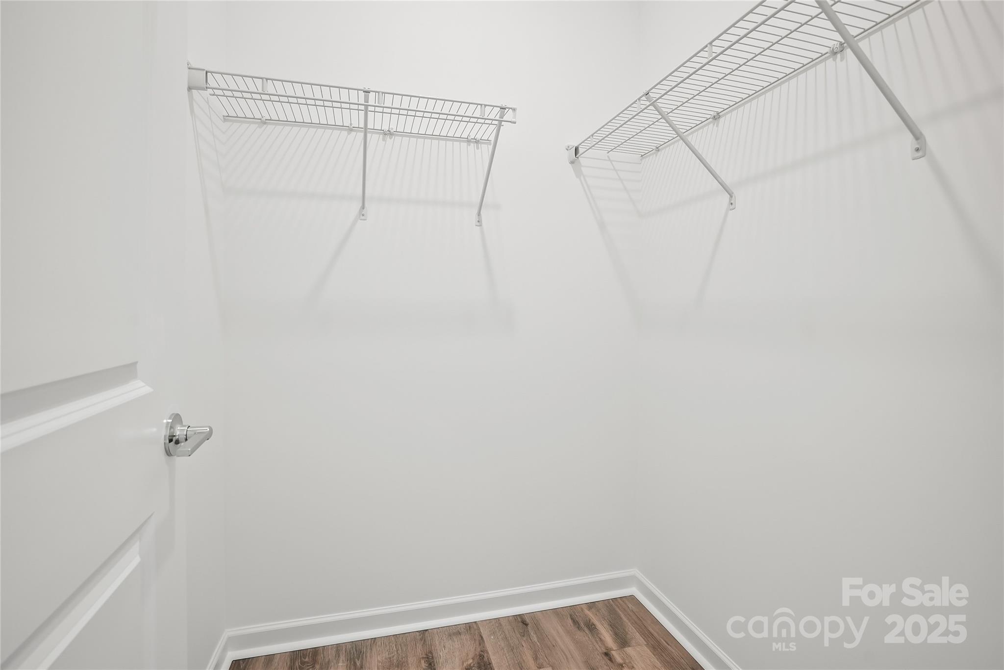 5007 Rill Court, Unit 35 Charlotte, NC 28262 - Photo 16 of 34 a view of a room with racks on the wall