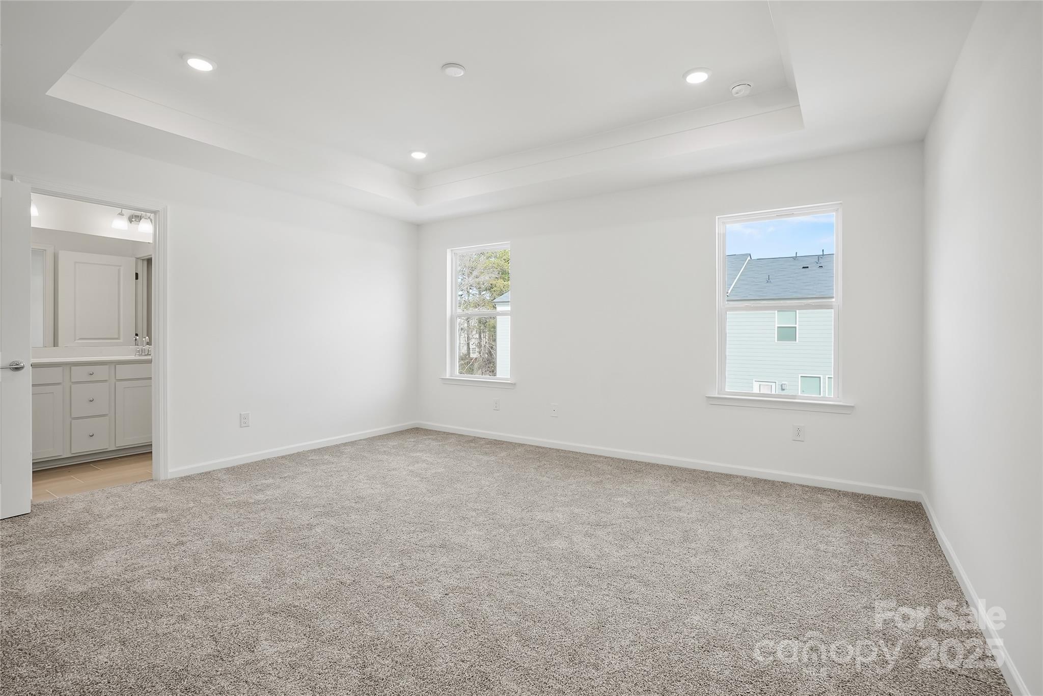 5007 Rill Court, Unit 35 Charlotte, NC 28262 - Photo 17 of 34 an empty room with windows and closet