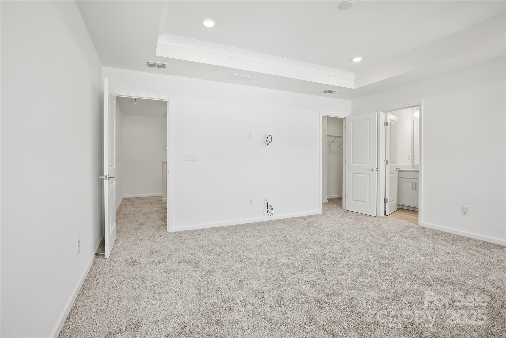 5007 Rill Court, Unit 35 Charlotte, NC 28262 - Photo 18 of 34 an empty room with closet area