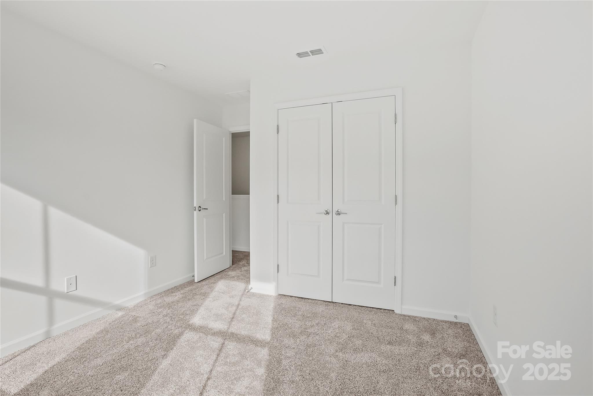 5007 Rill Court, Unit 35 Charlotte, NC 28262 - Photo 26 of 34 a view of an empty room