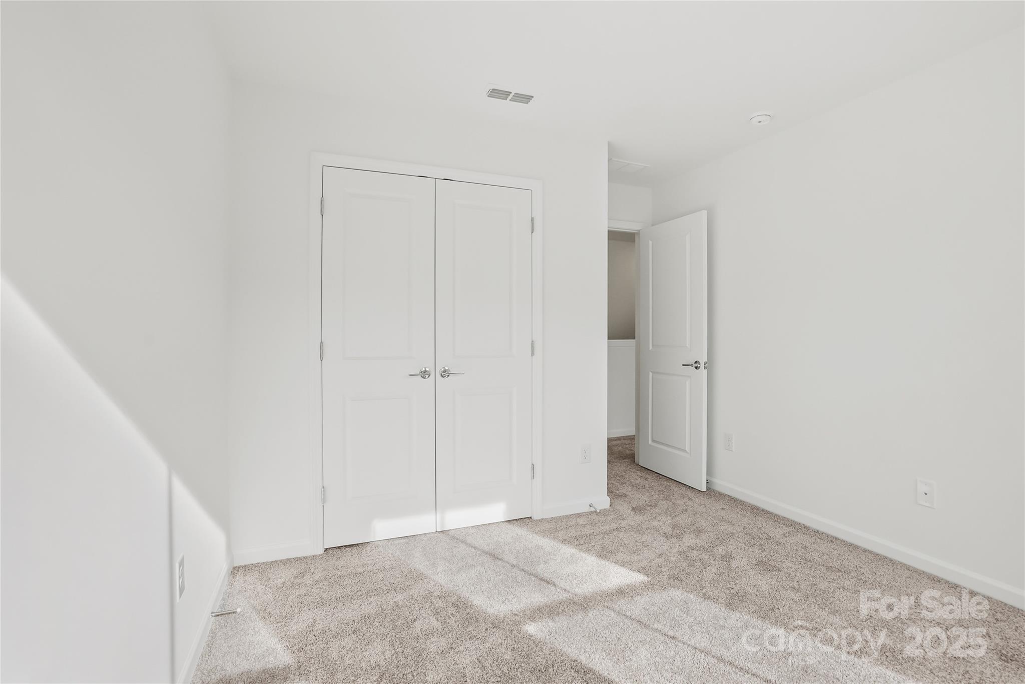 5007 Rill Court, Unit 35 Charlotte, NC 28262 - Photo 28 of 34 a view of an empty room