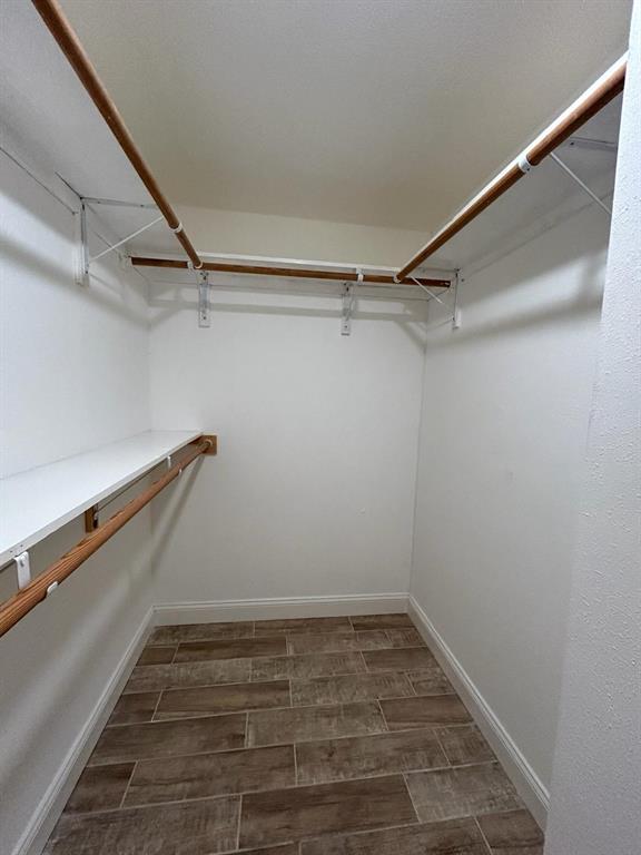 112 Elm Street Roxton, TX 75477 - Photo 18 of 21 a view of a room with wooden floor