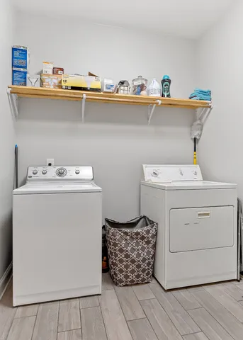 a utility room with washer and dryer