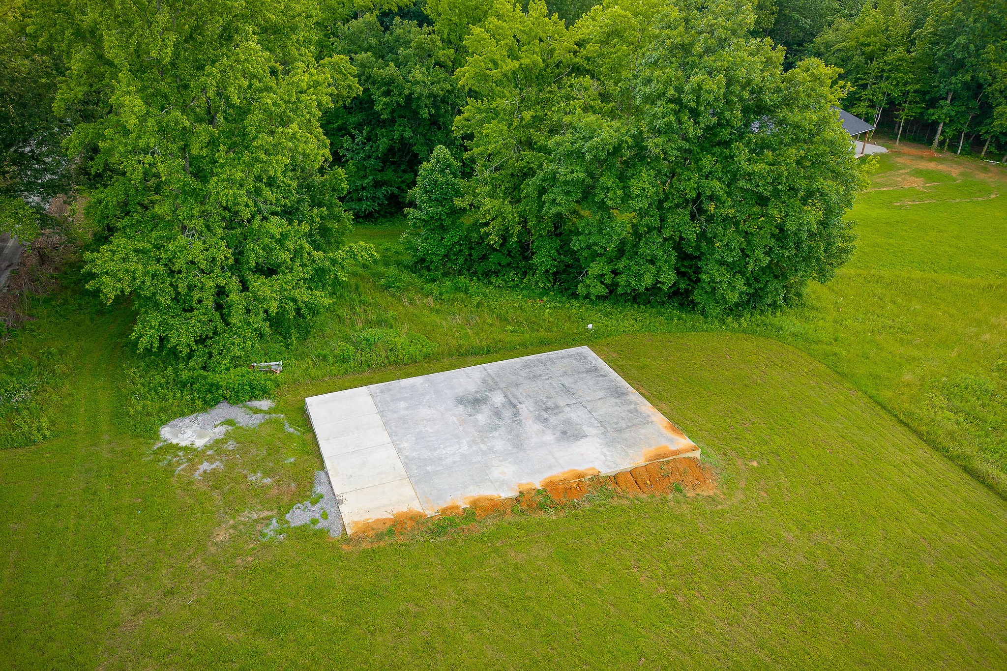 656 Osement Road McMinnville, TN 37110 - Photo 32 of 43 a view of a golf course with a lake