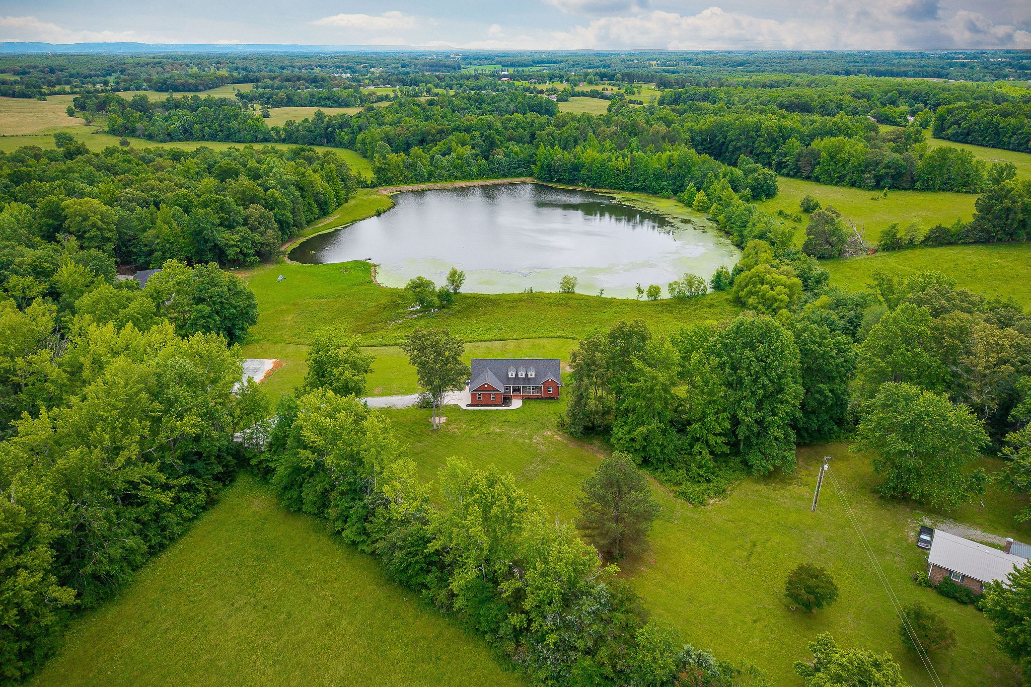 656 Osement Road McMinnville, TN 37110 - Photo 35 of 43 a view of a garden with an outdoor space