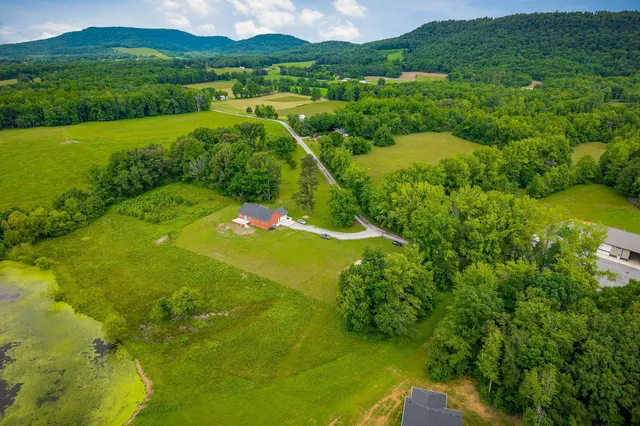 a view of a lake with a houses