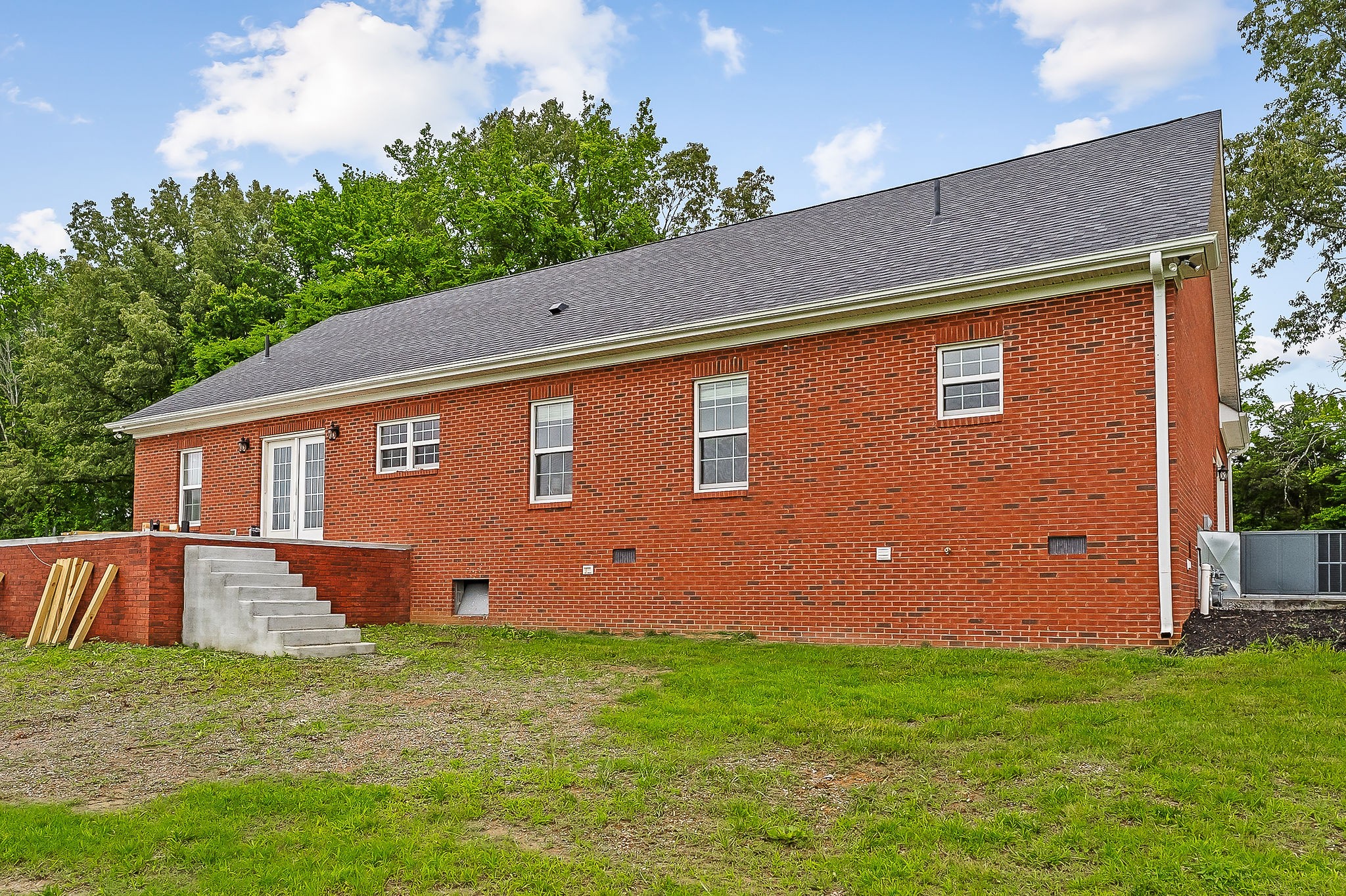 656 Osement Road McMinnville, TN 37110 - Photo 43 of 43 a backyard of a house with lots of green space