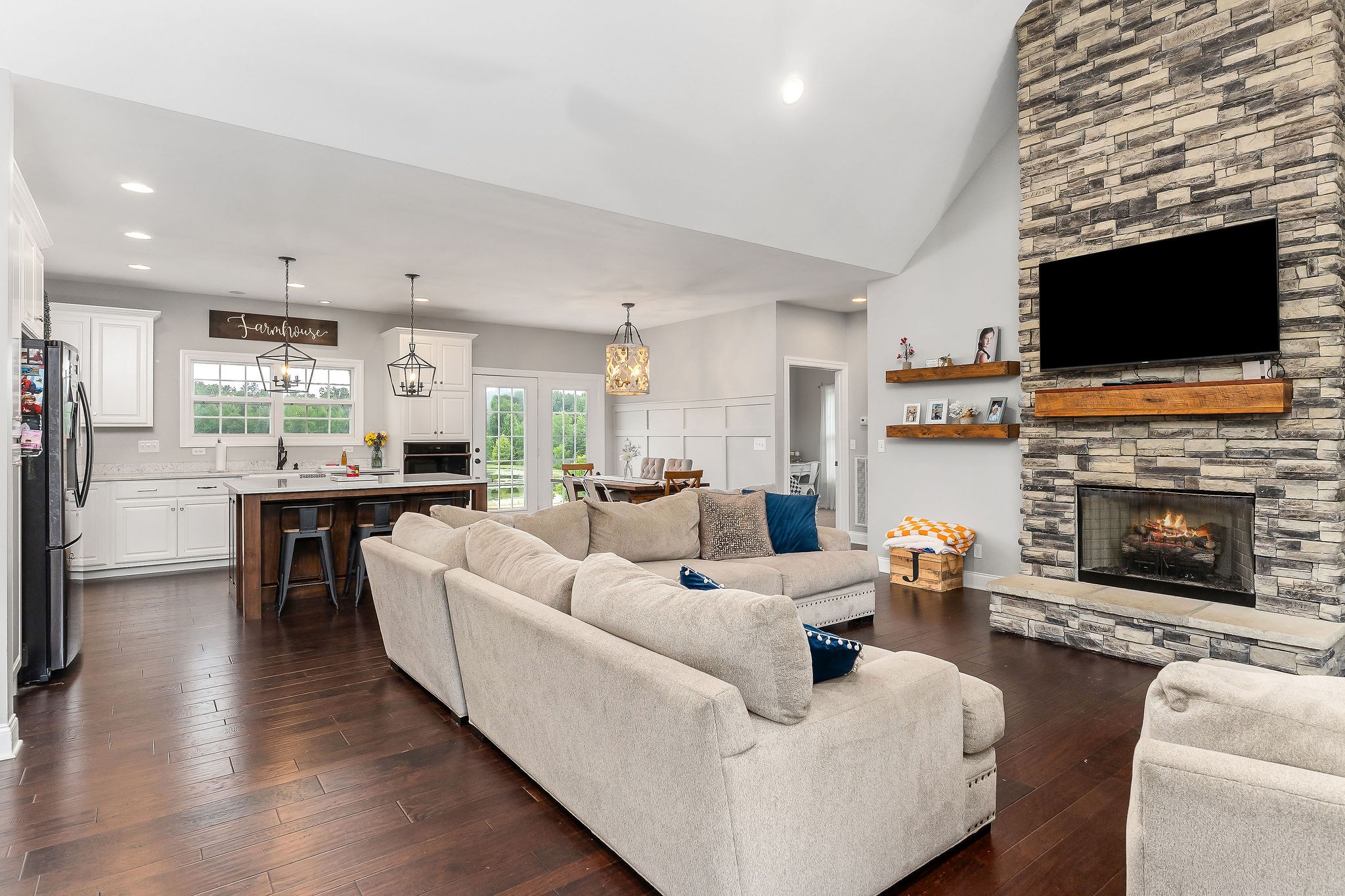 656 Osement Road McMinnville, TN 37110 - Photo 6 of 43 a living room with fireplace furniture and a flat screen tv