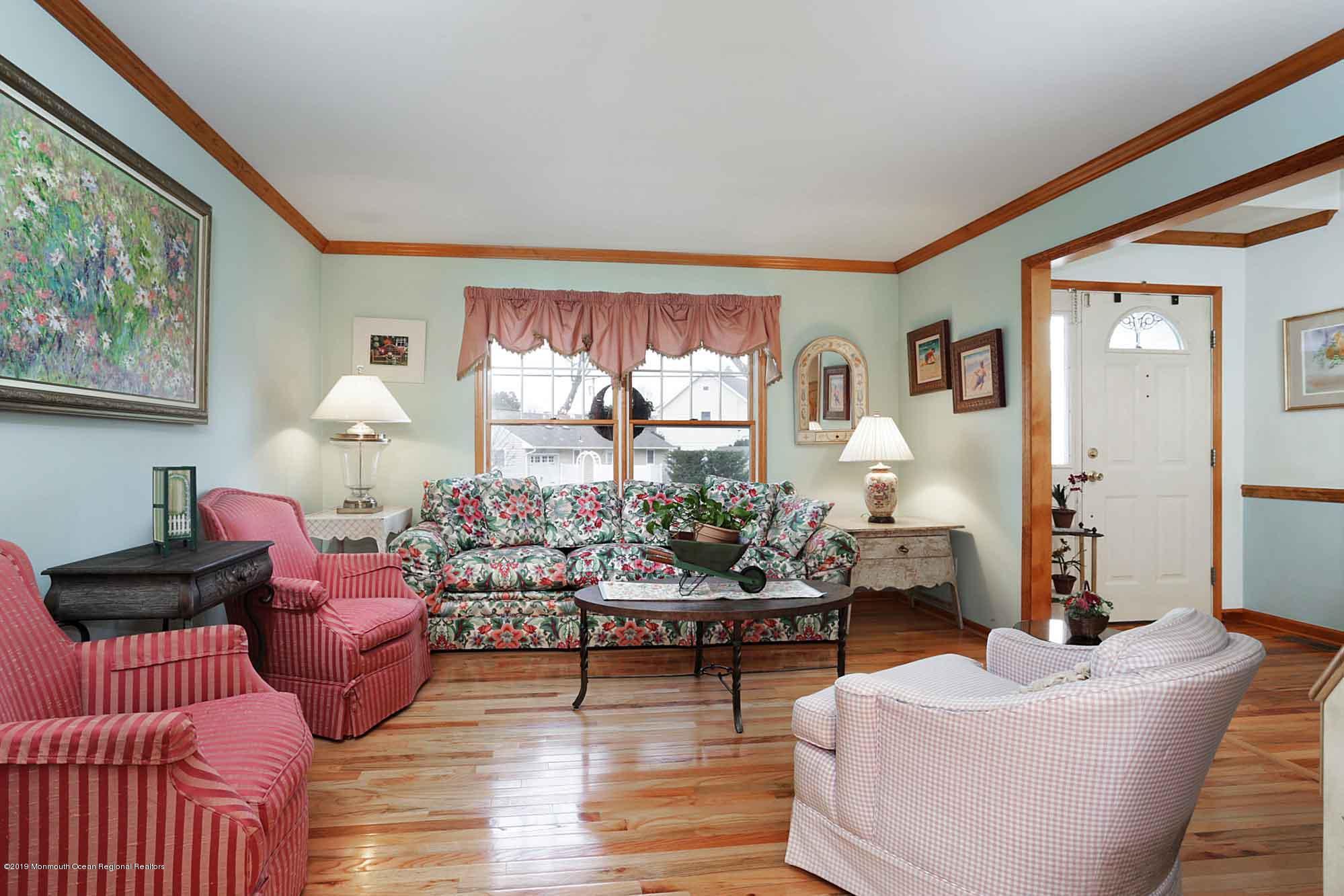 40 Ave Of Two Rivers Rumson, NJ 07760 - Photo 3 of 41 a living room with furniture and a large window