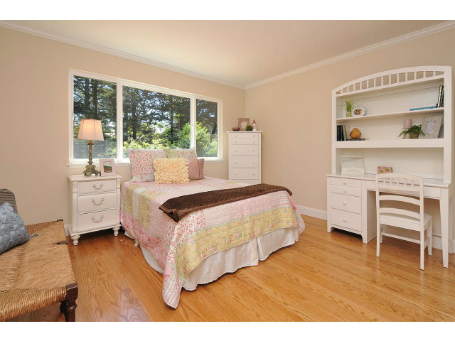 255 Darrell Road Hillsborough, CA 94010 - Photo 13 of 25 a bedroom with a bed and a window
