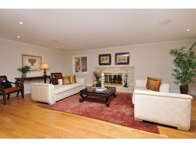 255 Darrell Road Hillsborough, CA 94010 - Photo 4 of 25 a living room with furniture and a couch