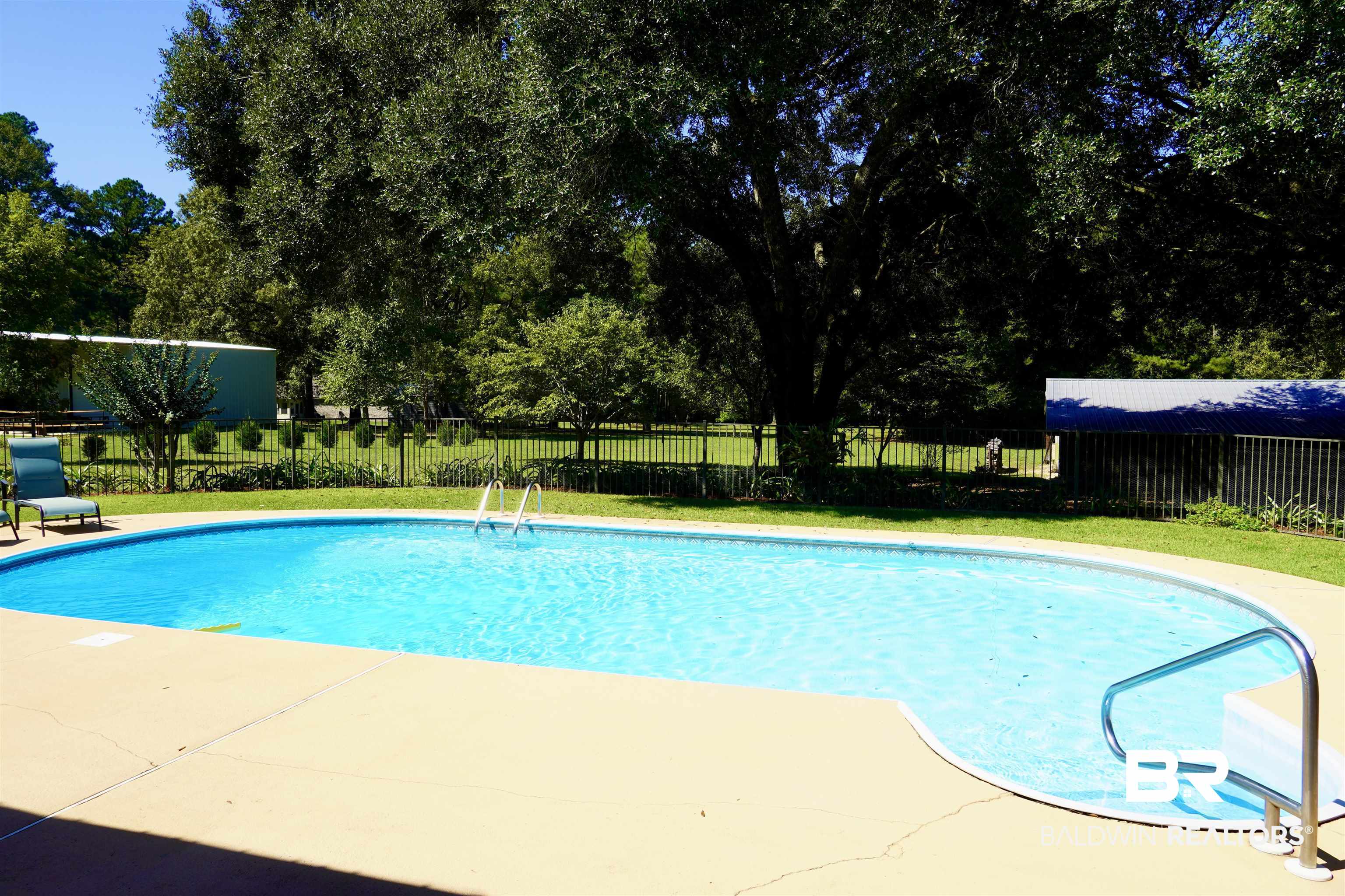 117 Belle Meade Brewton, AL 36426 - Photo 36 of 62 View of swimming pool with a patio