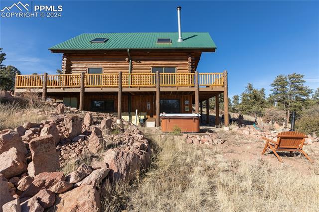 622 Sioux Road Florissant, CO 80816 - Photo 34 of 43 Side view showing the deck and a hot tub