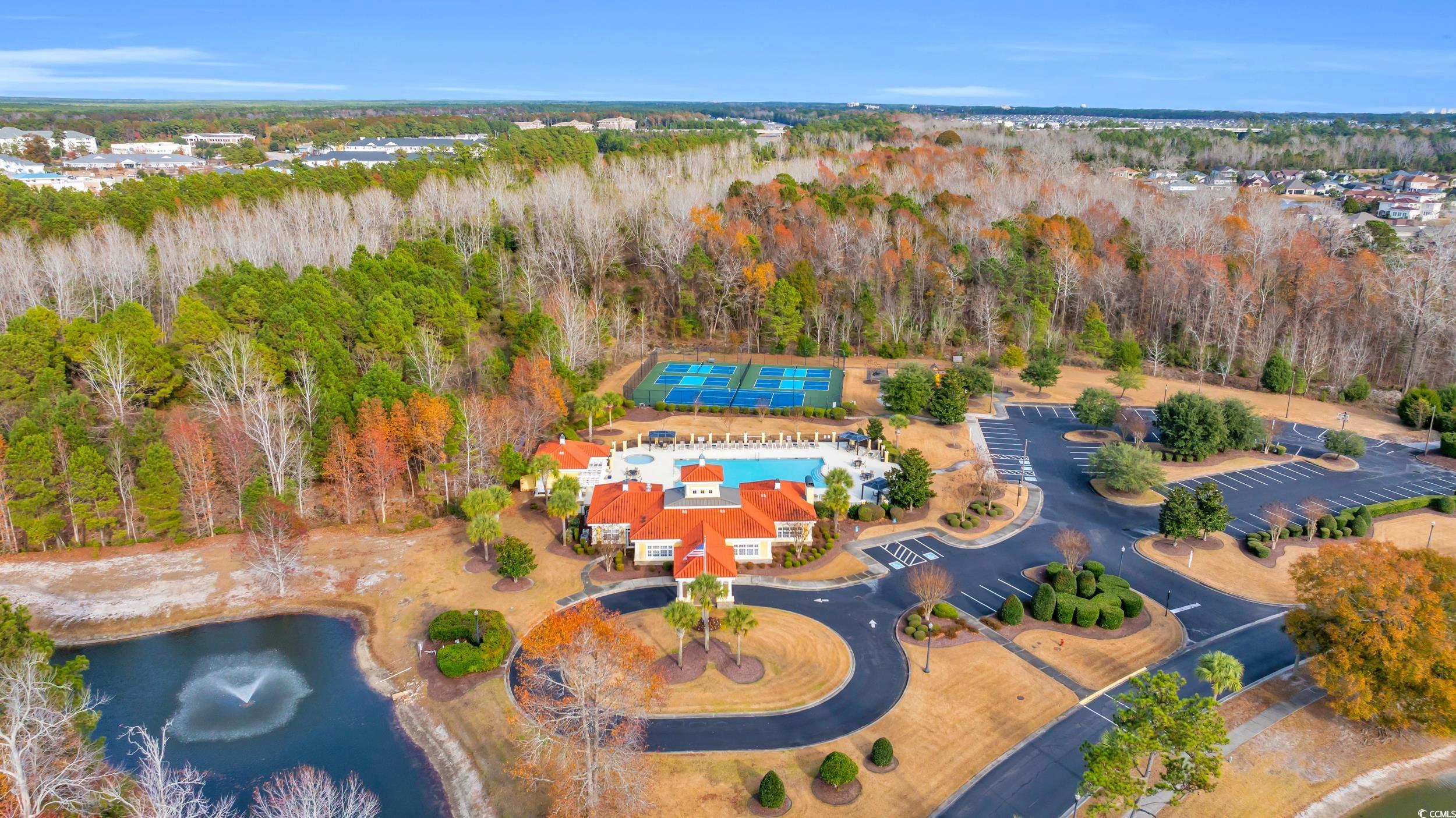 937 Bluffview Drive Myrtle Beach, SC 29579 - Photo 12 of 40 Aerial view of property and surrounding area featuring a forest and a nearby body of water