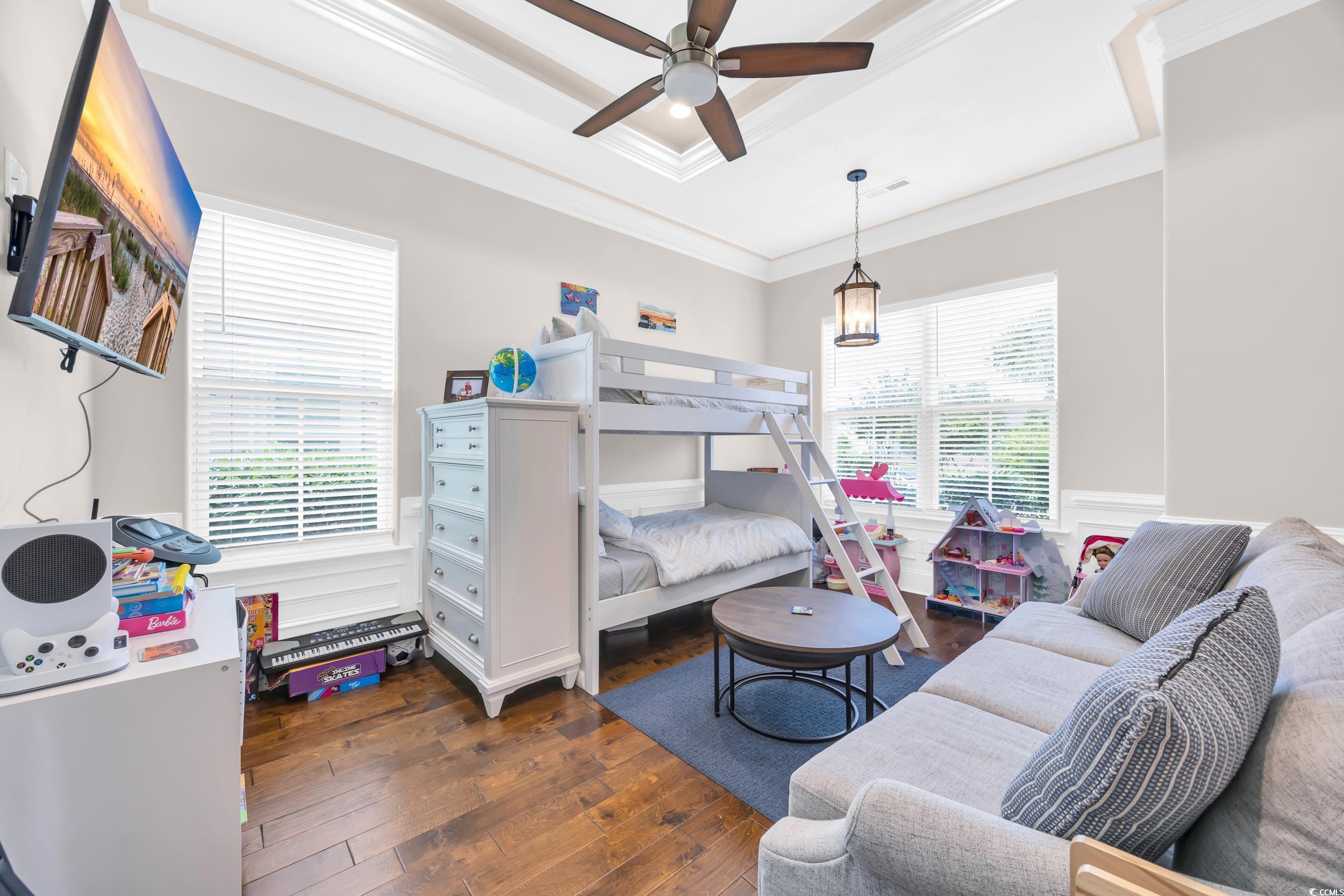 937 Bluffview Drive Myrtle Beach, SC 29579 - Photo 29 of 40 Bedroom featuring dark wood-style floors, a ceiling fan, and crown molding