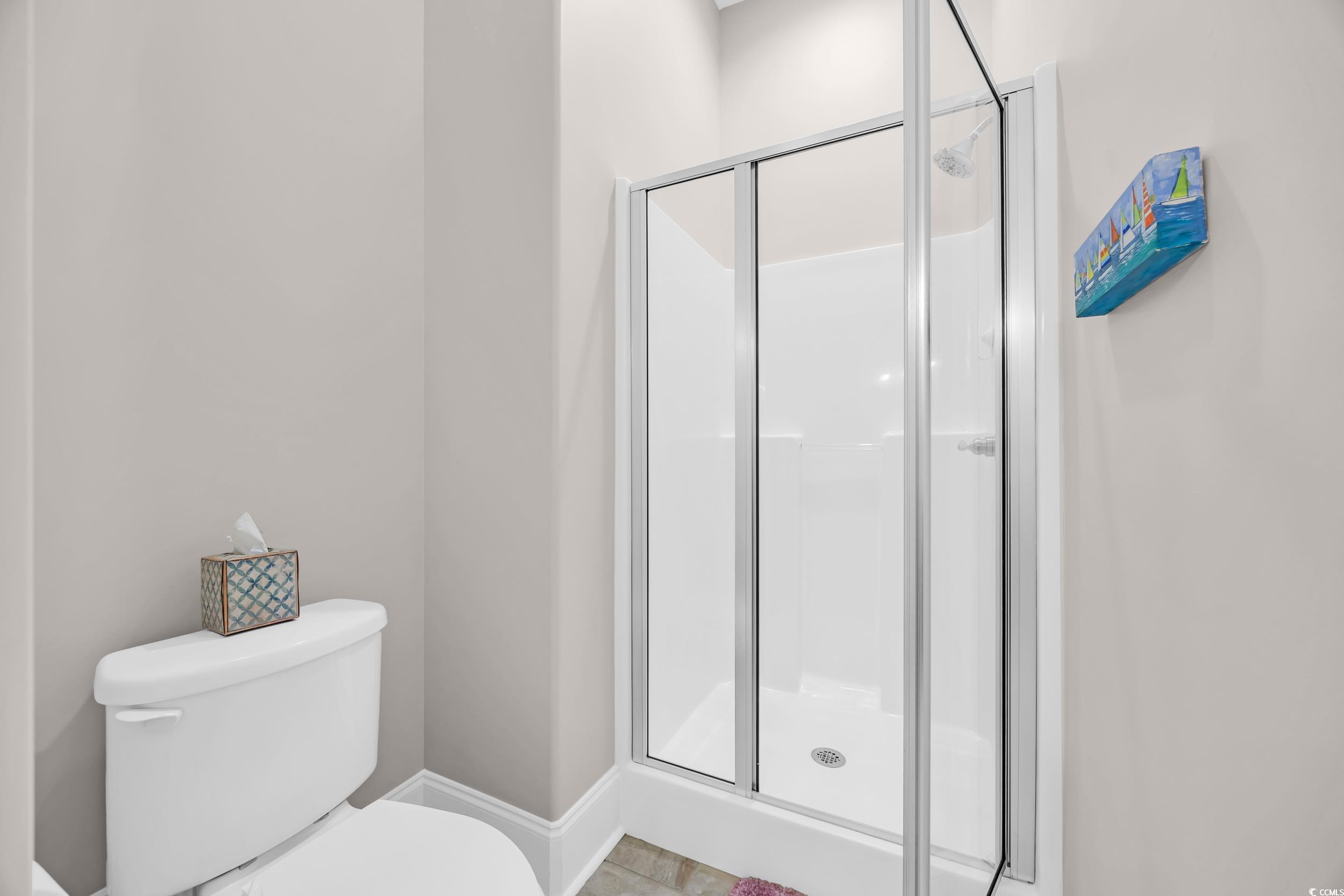 937 Bluffview Drive Myrtle Beach, SC 29579 - Photo 32 of 40 Bathroom with toilet and a stall shower